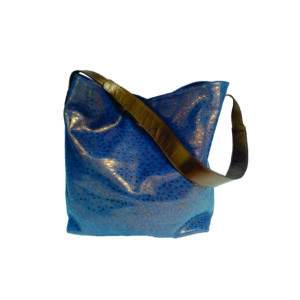 bolsa en folia azul con lunares bronce